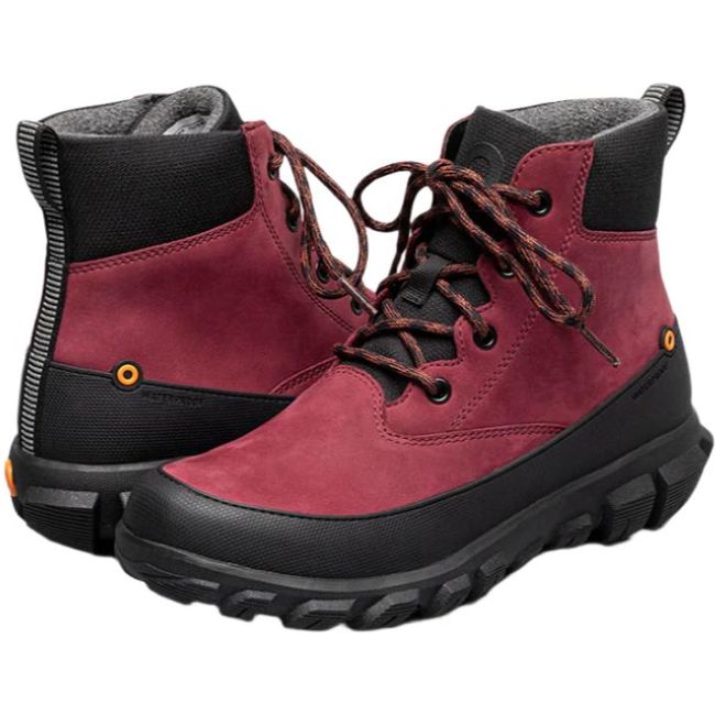 Pair of Women's Bogs Cedar Mid Waterproof Boots in Garnet red with a black sole