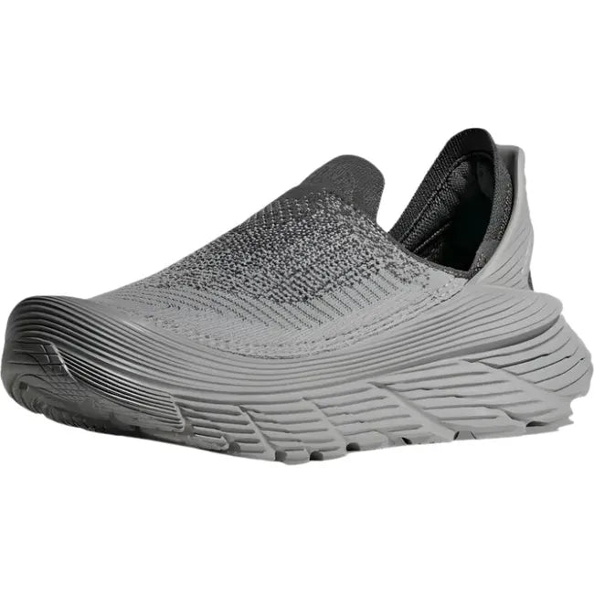 Medial side of Hoka Unisex Restore TC Recovery Shoe in Satellite Grey with slip on feature