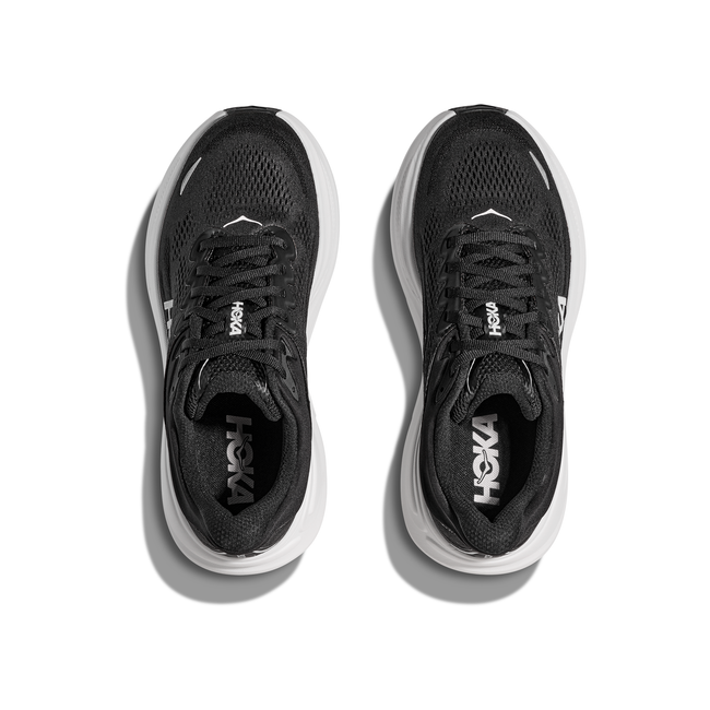 Top down view of Women's Hoka Bondi 9 Running Shoes in black mesh with a white sole and lace closure