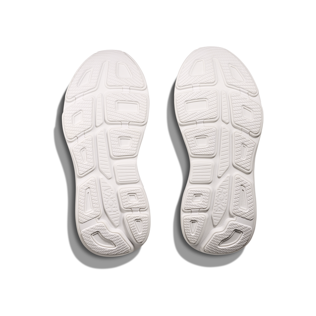 Soles of Women's Hoka Bondi 9 Running Shoes in all white with a white cushioned midsole and tread