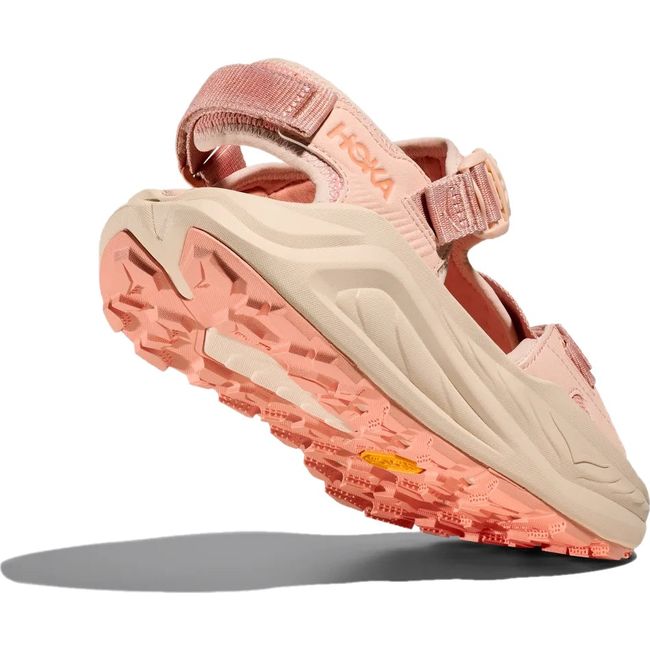 Vibram sole of Women's Hoka Infini Hike TC Hiking Sandal in Dawn Light Pink and Vanilla