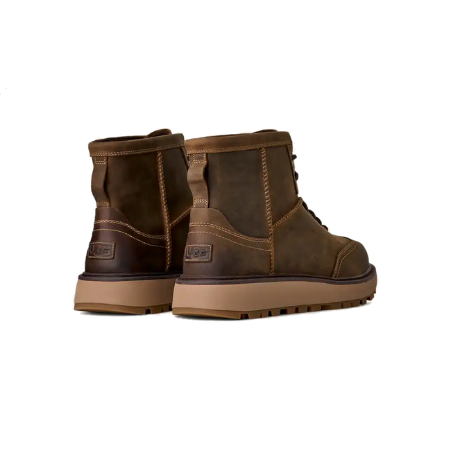 Heel of paired UGG Men's Idyllwild Lace Boot in Oak Brown