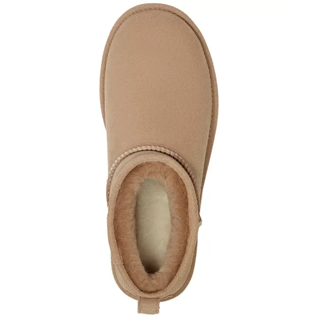 Upper of UGG Women's Classic Ultra Mini Boot in sand beige suede