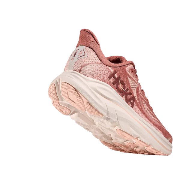 Angled Heel of Hoka Women's Clifton 10 Running Shoe in Rose Latte Pinkish Red
