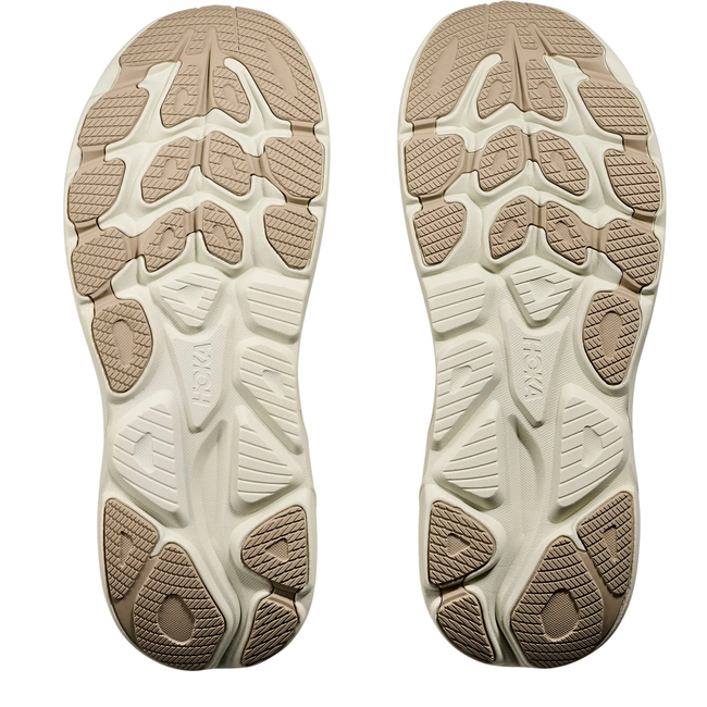 Soles of Hoka Men's Clifton 10 Running Shoe in Raw Linen