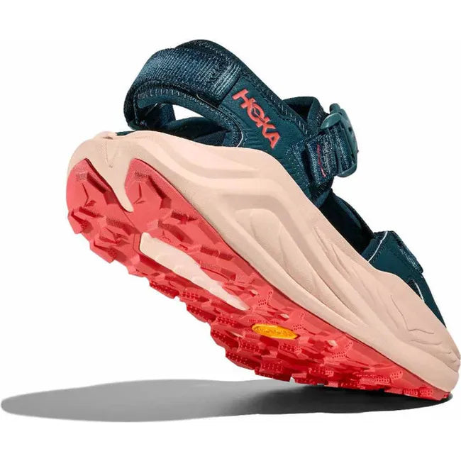 Heel angled up of Women's Hoka Infini Hike TC Hiking Sandal in Blue Twilight Grapefruit