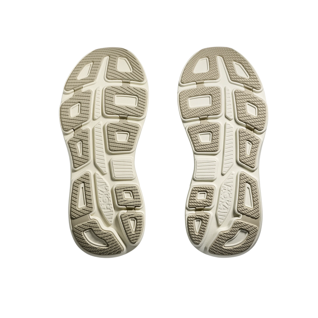 Soles of Hoka Women's Bondi 9 Running Shoe in Truffle Salt