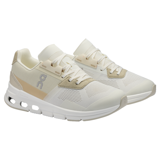 Pair of Women's On Cloud Cloudrift Shoes in beige and white