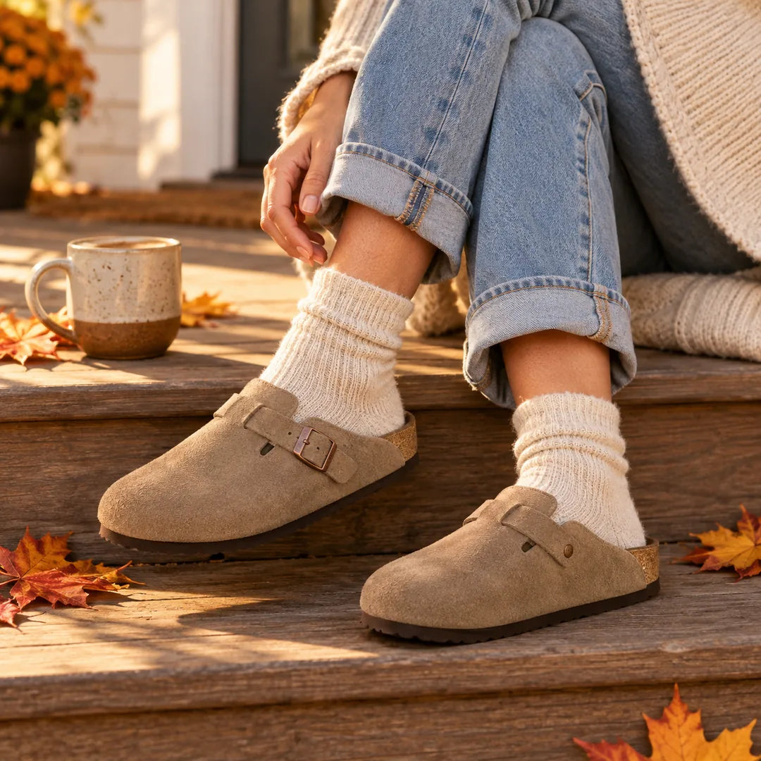 Women's fall shoes at Roderer Shoe Center: a cognac Taos lace-up boot, white Hoka running shoe, taupe Birkenstock Boston clog and chestnut UGG Tasman slipper