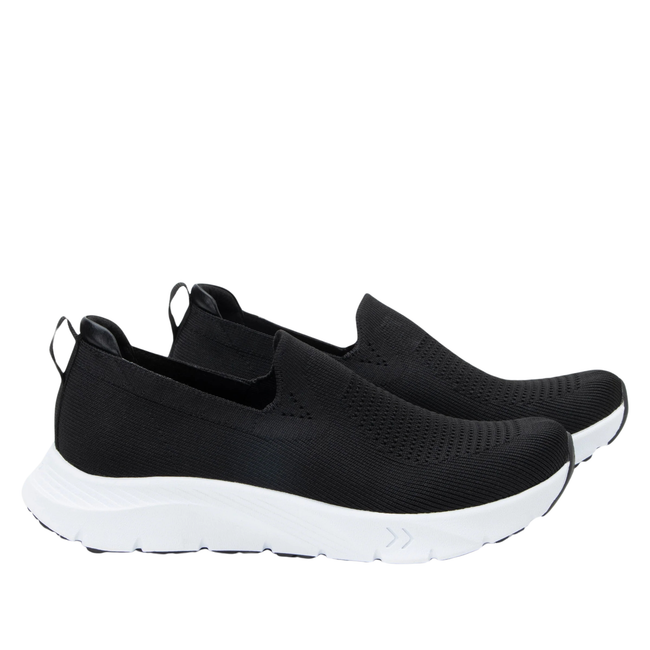 Lateral view of Women&#39;s Alegria Waze slip on shoes in black knit upper and white soles