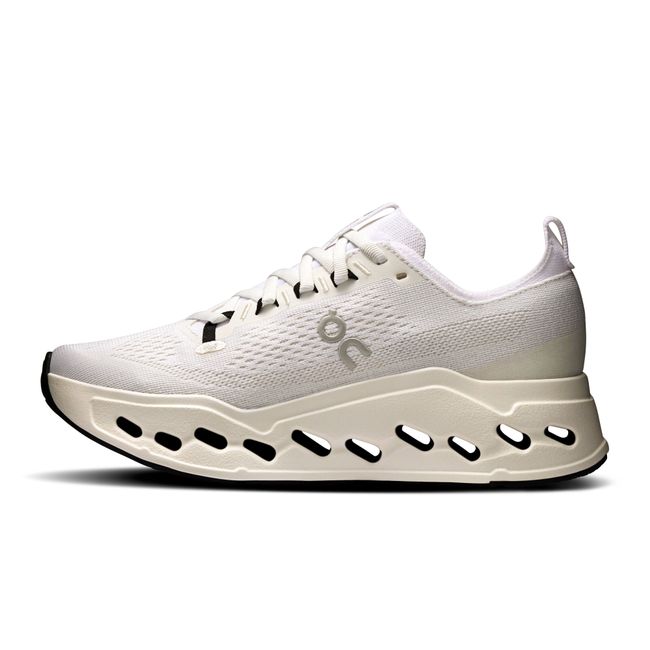 Medial side of Women's On Running Cloudsurfer Max Cushioned Running Shoe in All White