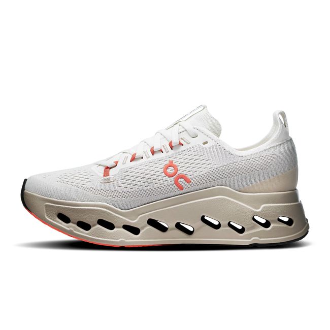 Medial side of Women's On Running Cloudsurfer Max Cushioned Running Shoe in white, Ivory, Salmon