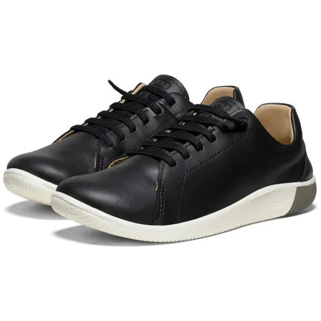 Pair of Women's Keen KNX Leather Sneakers in Black Star White colorway