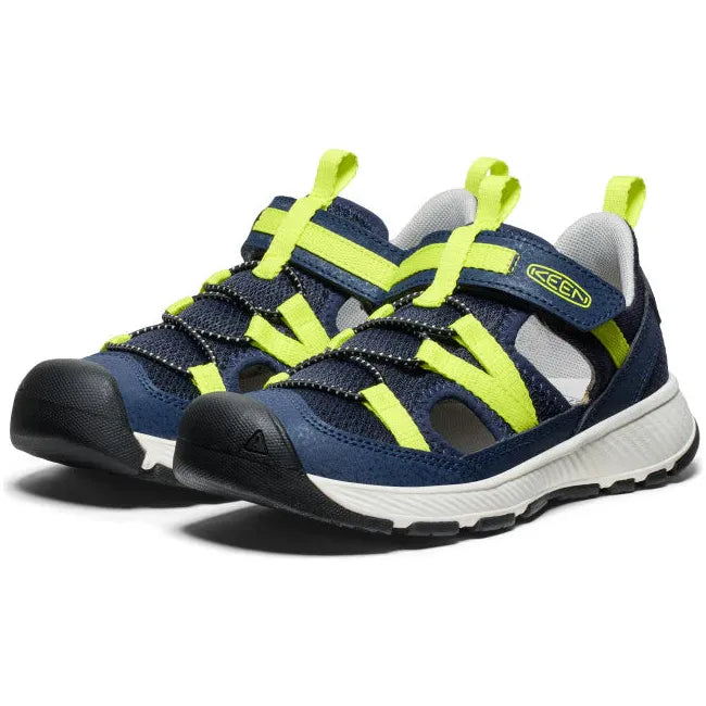 Pair of KEEN Big Kids' Motozoa Closed Toe Sandal in Naval Academy blue Evening Primrose yellow
