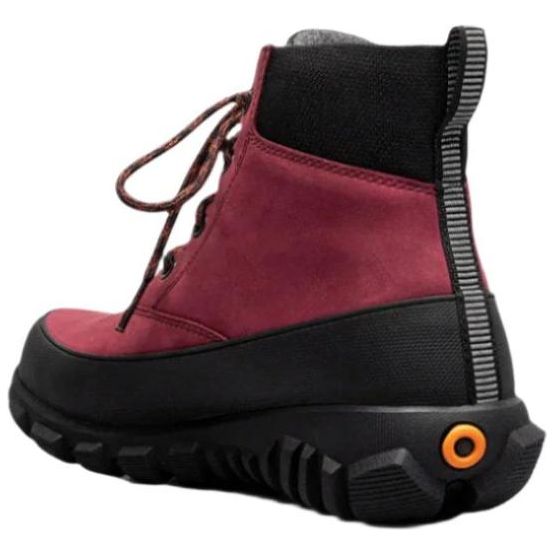 Heel angled view of Women&#39;s Bogs Cedar Mid Waterproof Boot in Garnet red with a black sole