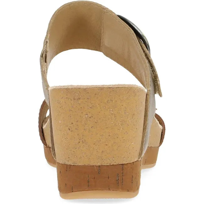 Heel of Women's Dansko Shannon Wedge Sandal in tan and gold with velcro straps