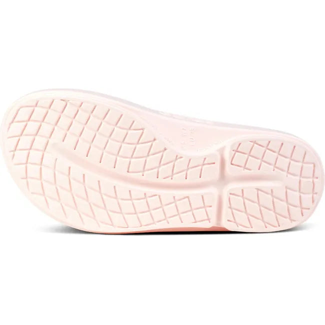 Sole of Unisex OOfos OOriginal Sandal in Blush Pink