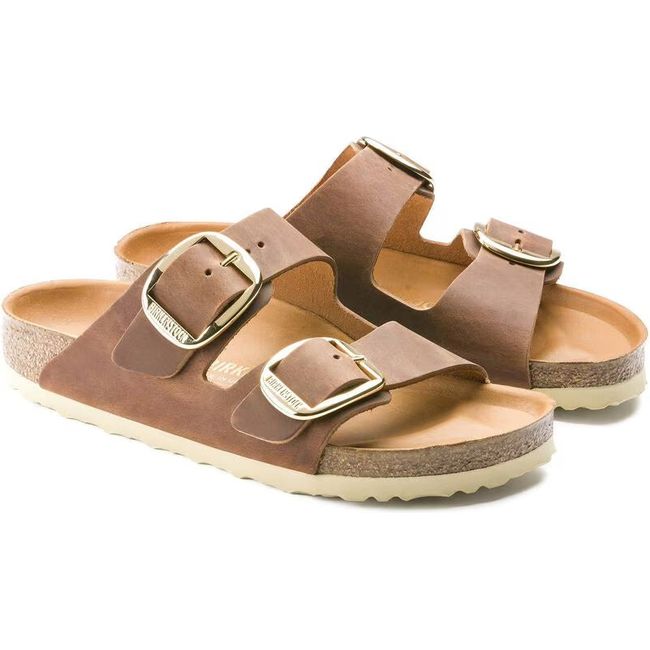 Pair of Birkenstock Women's Arizona Big Buckle Oiled Leather Sandals in cognac