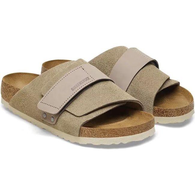 Pair of Birkenstock Women's Kyoto Nubuck Suede Leather Narrow Sandals in taupe