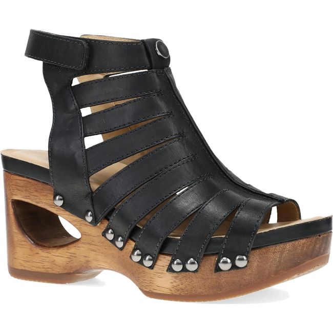 Lateral side of Women's Dansko Adie Heel in Black Calf leather. A gladiator style heel