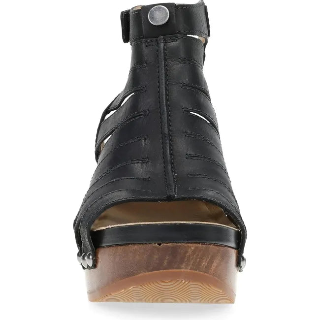 Front of Women's Dansko Adie Heel in Black Calf leather. A gladiator style heel