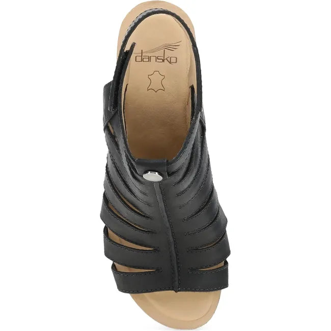 Top down view of Women's Dansko Adie Heel in Black Calf leather. A gladiator style heel
