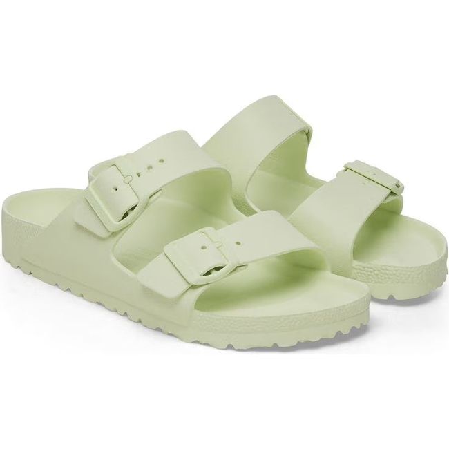 Pair of Birkenstock Women's Arizona EVA Sandals in faded lime