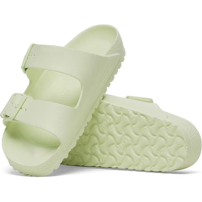 Upper and sole of Birkenstock Women's Arizona EVA Sandals in faded lime