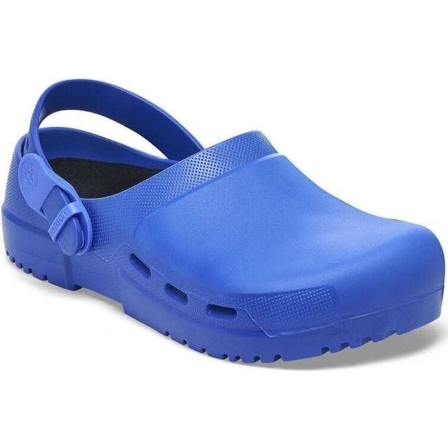 Angled view of the blue Birkenstock Unisex Birki Air 2.0 Professional Clog featuring a fluid-resistant design ideal for healthcare and utility. It includes side air vents for breathability, a polyurethane sole that is oil- and grease-resistant, a convertible backstrap, and an adjustable detergent-friendly backstrap similar to Crocs.