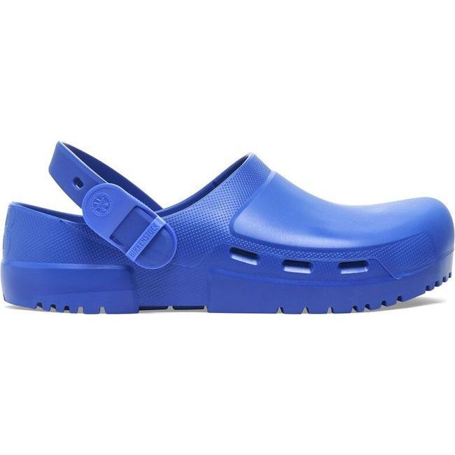 Side view of the blue Birkenstock Unisex Birki Air 2.0 Professional Clog featuring a fluid-resistant design ideal for healthcare and utility. It includes side air vents for breathability, a polyurethane sole that is oil- and grease-resistant, a convertible backstrap, and an adjustable detergent-friendly backstrap similar to Crocs.