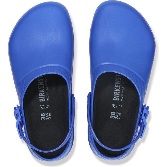 A top view of a pair of blue Birkenstock Unisex Birki Air 2.0 Professional Clogs, featuring a fluid-resistant design perfect for healthcare and utility. The black removable insoles are lined with microfiber for moisture-wicking properties, and the backstraps are convertible, similar to Crocs.
