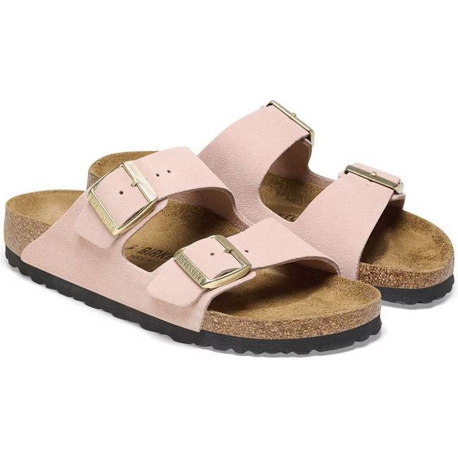 Pair of Birkenstock Women's Arizona Suede Sandals in light rose