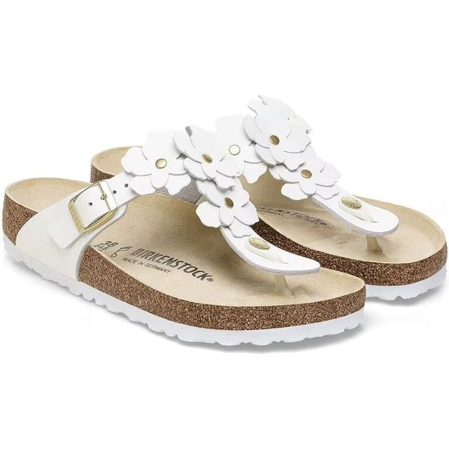 Pair of Birkenstock Women's Gizeh Flower Sandals in white leather