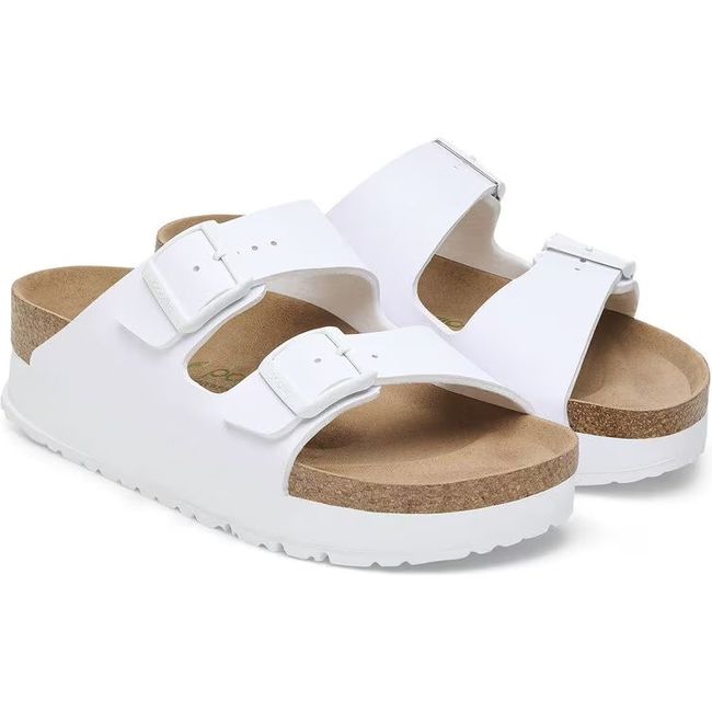 Pair of White Birkenstock Women's Arizona Platform Vegan Narrow Sandals