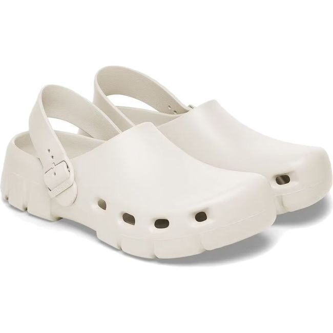 Pair of Unisex Birki Flow Birkenstock Recovery Clogs in eggshell white with backstraps