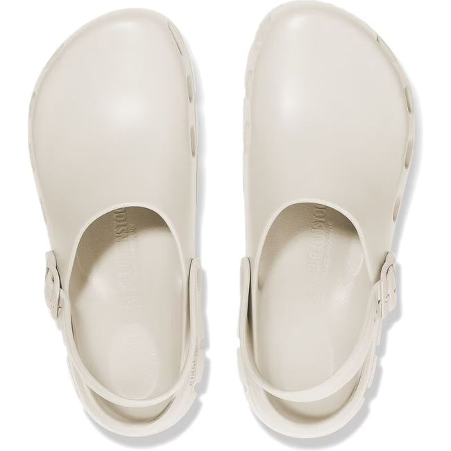 Top down view of Unisex Birki Flow Birkenstock Recovery Clogs in eggshell white with backstraps