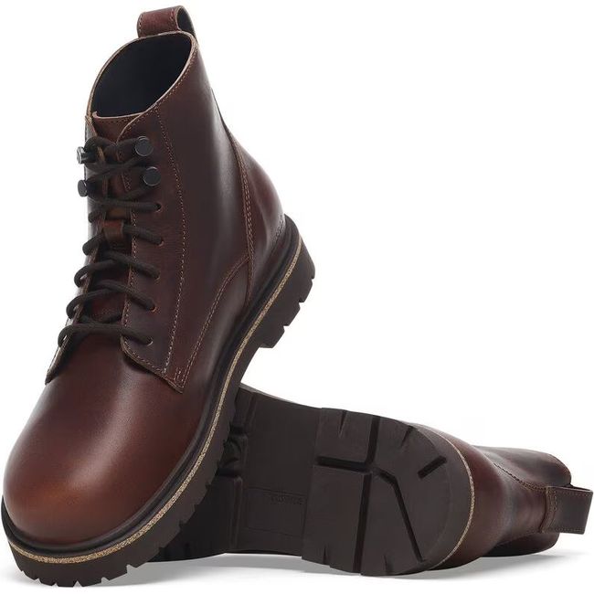 Pair of chocolate brown leather Birkenstock Highwood mid boots showing the sole and lace up upper