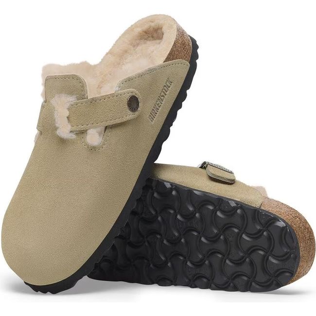 Pair of Tan Suede Birkenstock Clog with Shearling Lining showing the sole and upper