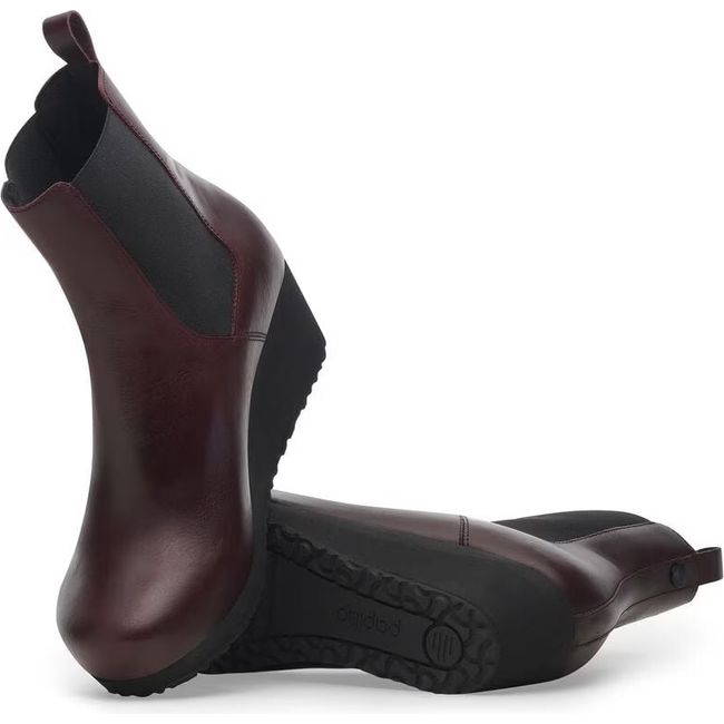 Upper and sole of Women's Birkenstock Ebba Slip On Wedge Boots in Zinfandel brown leather