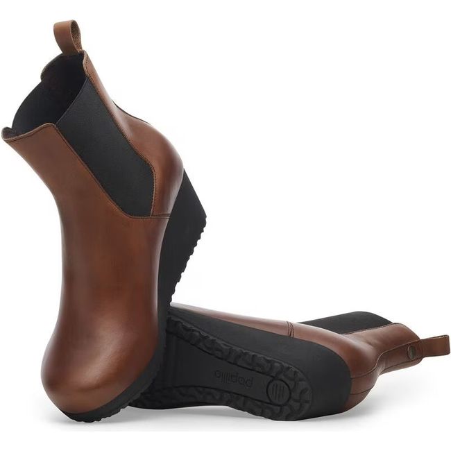 Upper and sole of Women's Birkenstock Ebba Slip On Wedge Boot in black and cognac leather