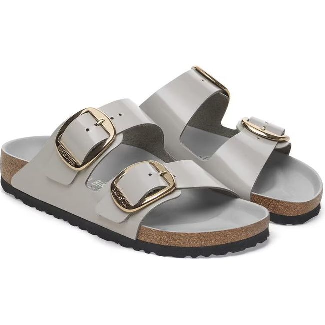 Pair of Birkenstock Women&#39;s Arizona Big Buckle Narrow Sandals in high shine stone coin