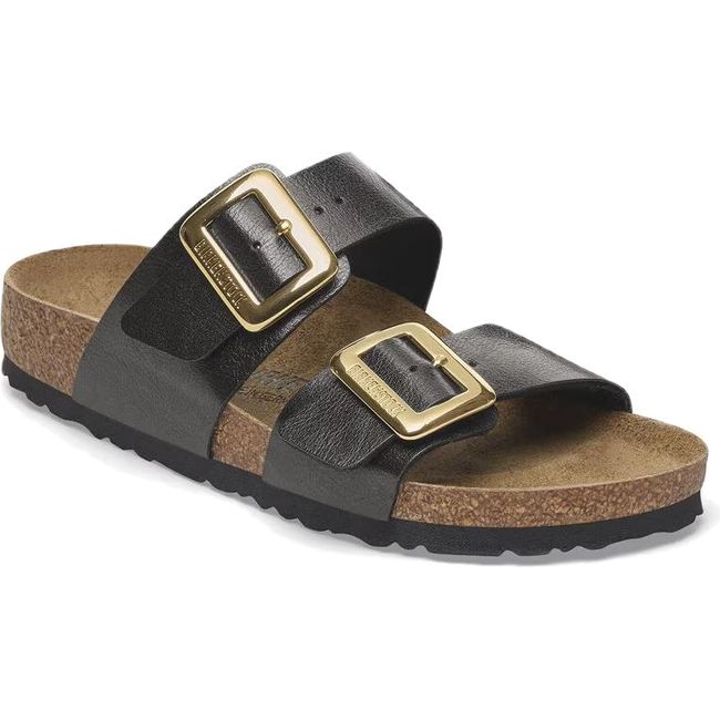 Angled view of Birkenstock Women's Sydney Luxe Buckle Birko Flor Narrow Sandal in graceful licorice