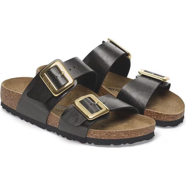 Pair of Birkenstock Women&#39;s Sydney Luxe Buckle Birko Flor Narrow Sandals in graceful licorice