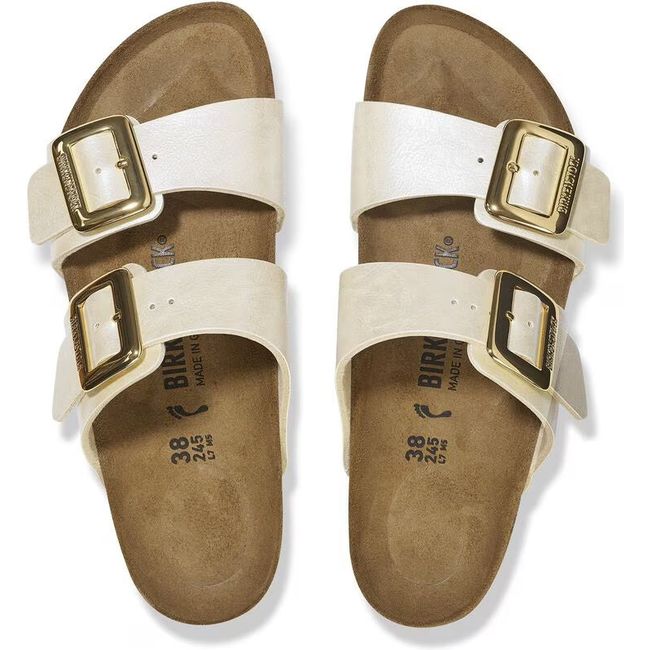 Top down view of Birkenstock Women's Sydney Luxe Buckle Birko-Flor Narrow Sandals in pearl white