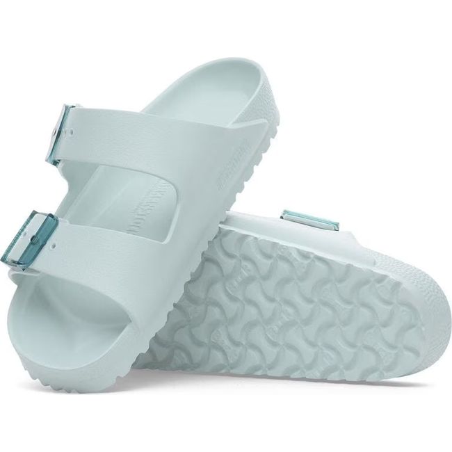 Upper and sole of Birkenstock Women's Arizona EVA Stealth Buckle Narrow Sandals in surf green