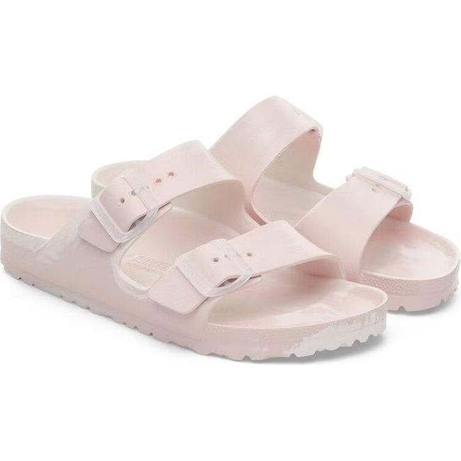 Pair of Bikenstock Women&#39;s Arizona EVA Narrow Sandals in light rose