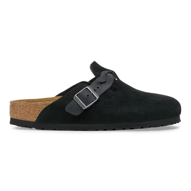 Lateral side of Birkenstock Women’s Boston Braid Suede clog in black suede