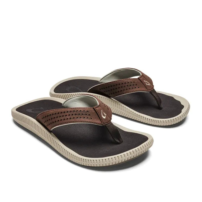 Pair of Men's Olukai Ulele Flip Flop with Dark Wood brown straps, brown footbed, and white sole