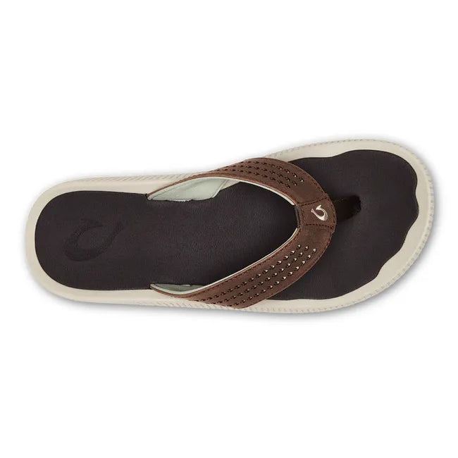 Top down view of Mens Olukai Ulele Flip Flop. Dark Wood brown straps, brown footbed, and white sole