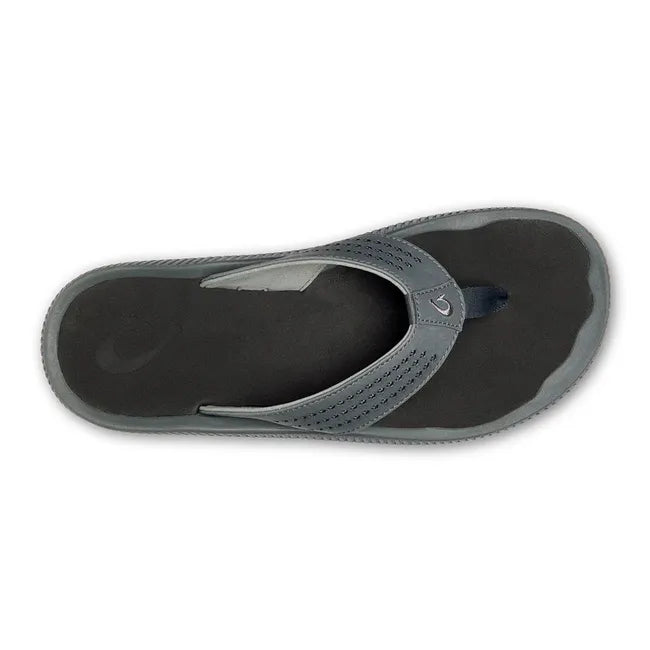 Top side down of Men's Olukai Ulele Flip Flop in Dark Shadow with a Black footbed